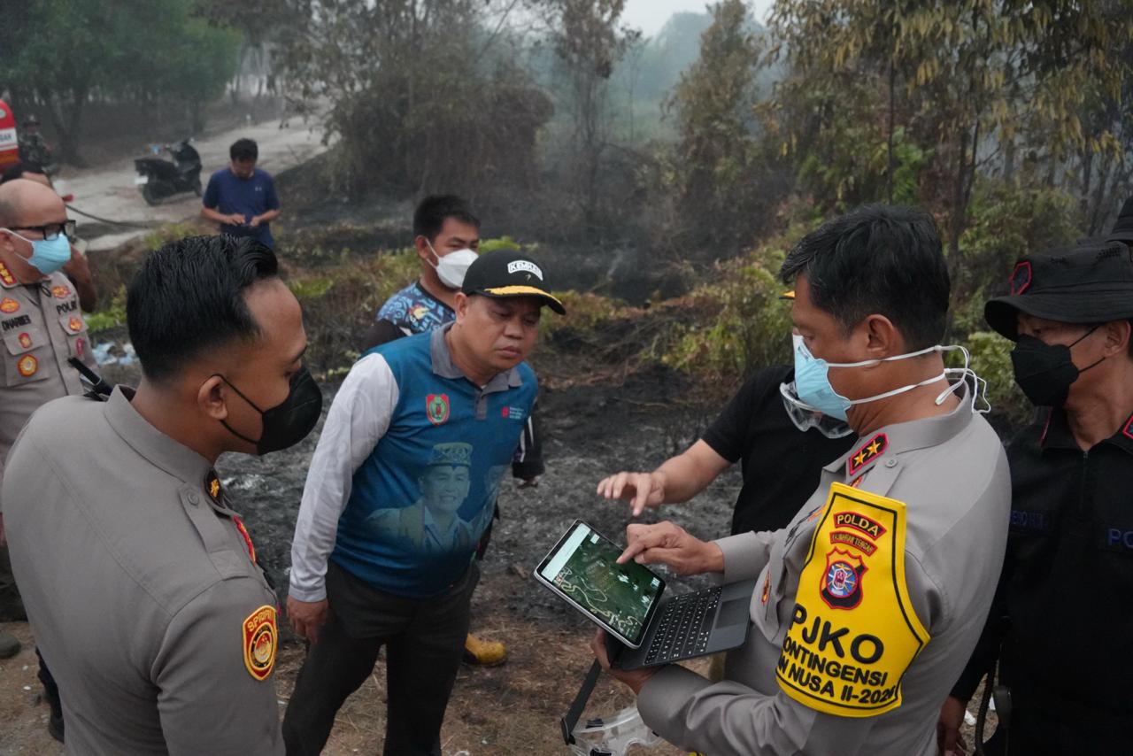 Pantau Karhutla di Bukit Rawi Bersama Gubernur dan Pangdam, Kapolda Kalteng Pastikan Ketersediaan Su